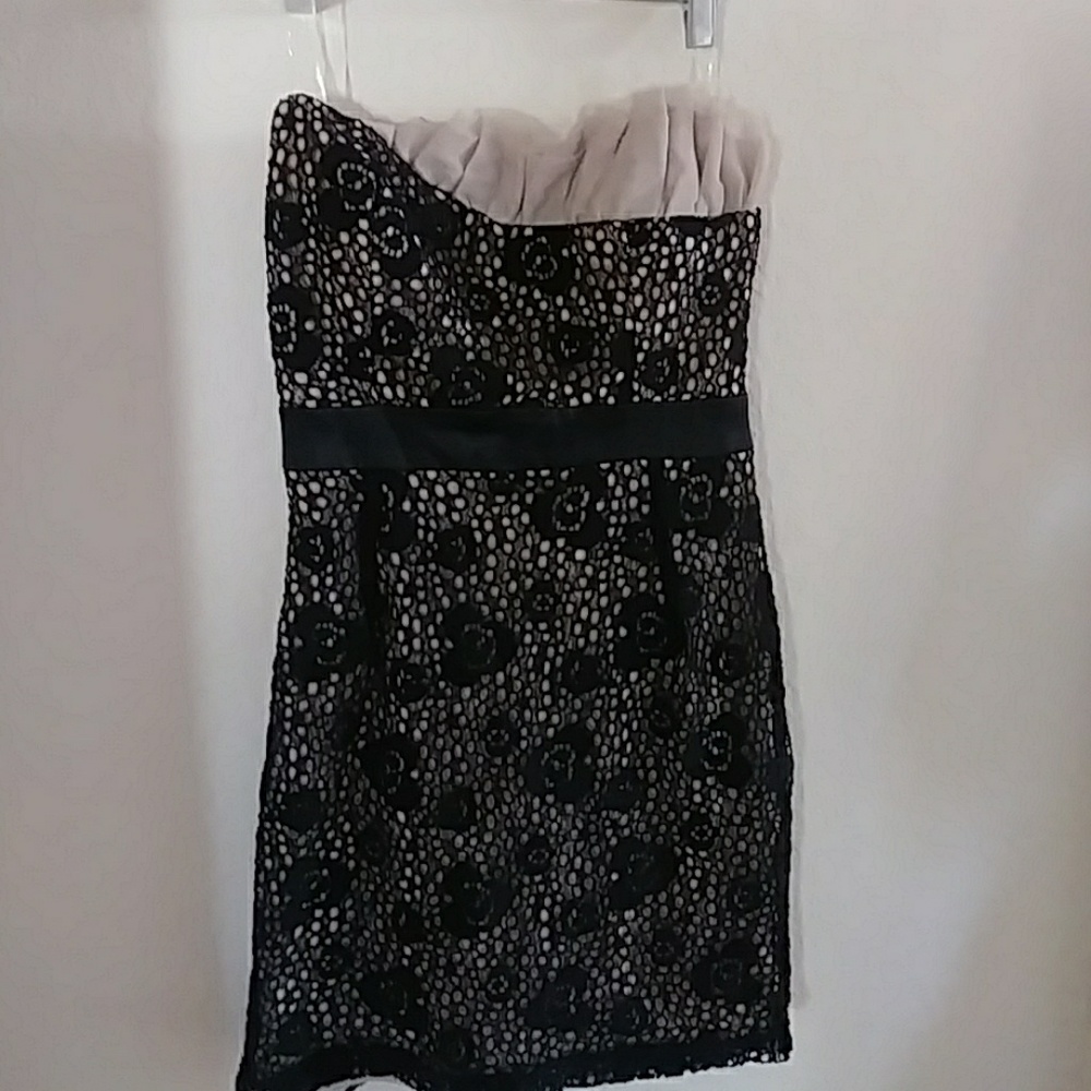MYSTIC strapless dress.